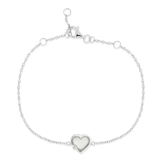 Armband van 925 zilver met een hartvormige hanger van moedermelkhars en een kleine zirkonia.